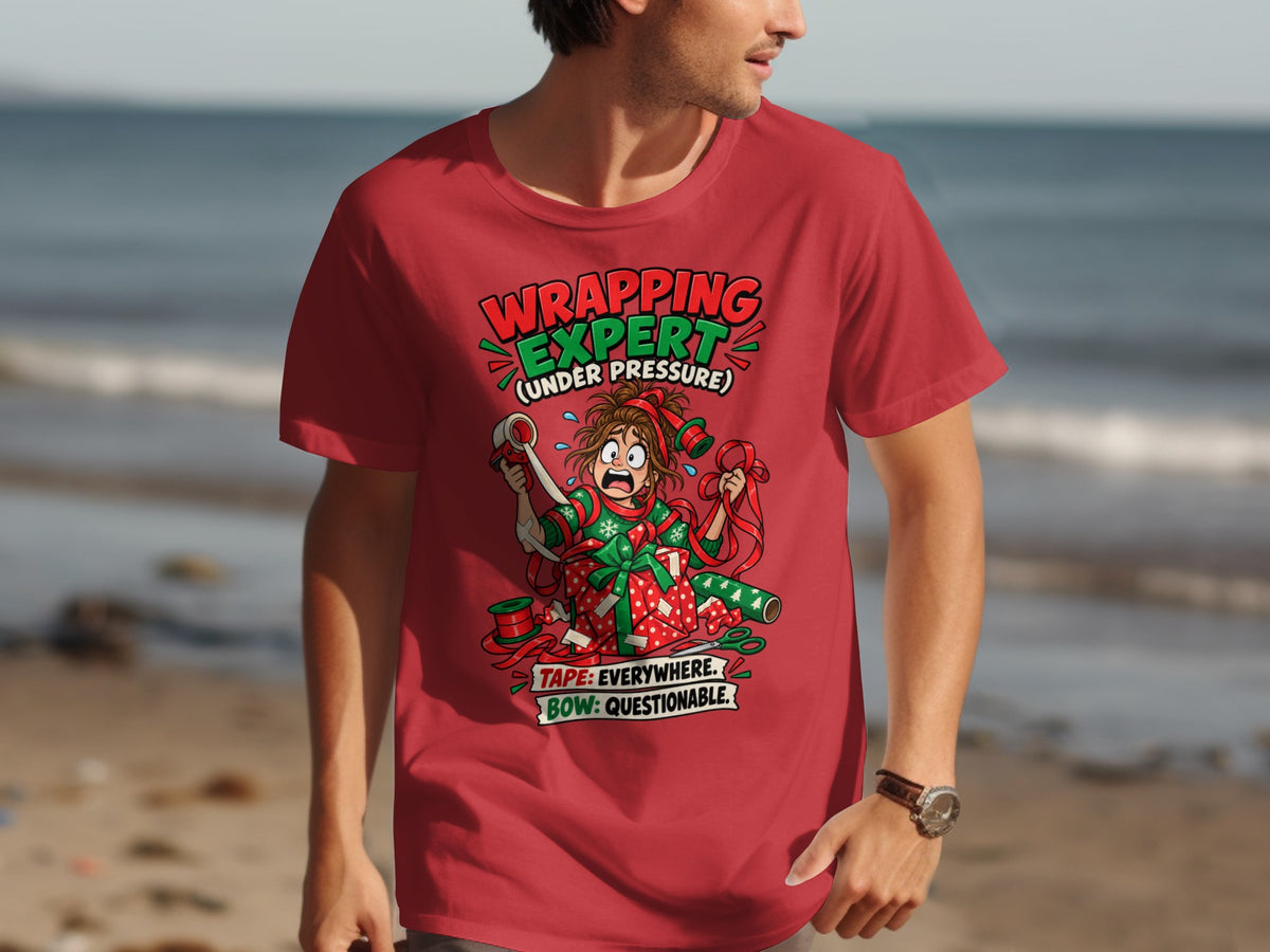 Red t-shirt with cartoon of stressed person gift wrapping, "Wrapping Expert" text.