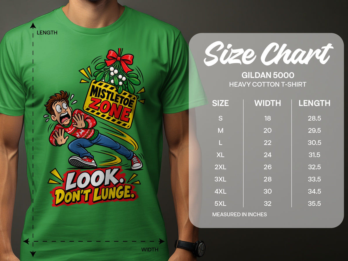 Green t-shirt with a cartoon man avoiding mistletoe, and a Gildan 5000 size chart.