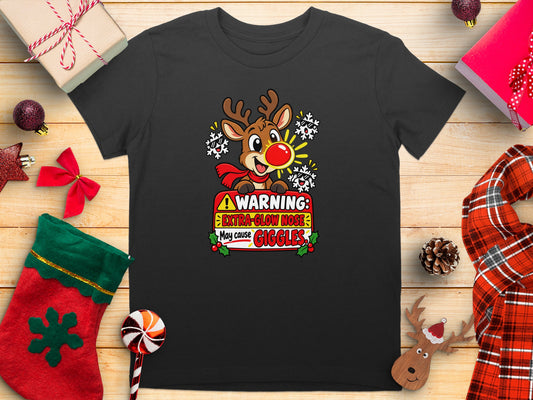 Black t-shirt with a cartoon reindeer and "Warning: Extra-Glow Nose May Cause Giggles" text.