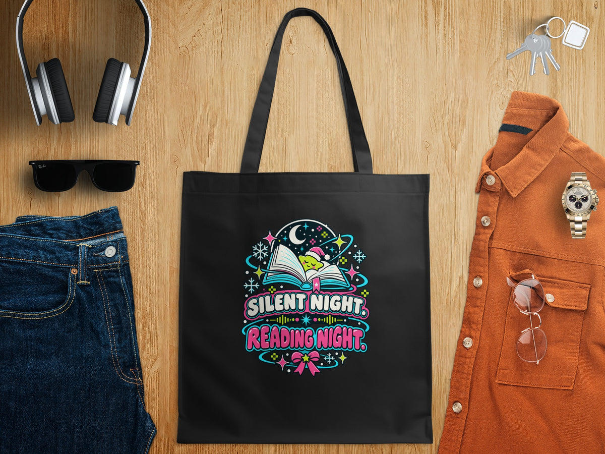 Black tote bag with "Silent Night Reading Night" text and festive book graphic.