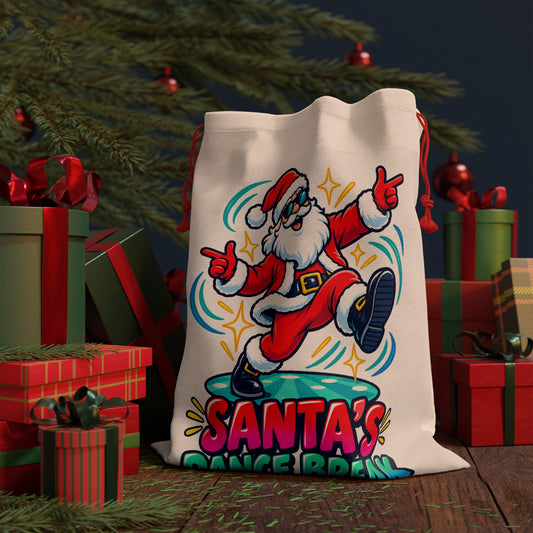 Cream Santa bag with "Santa's Dance Break" text and a dancing Santa graphic.