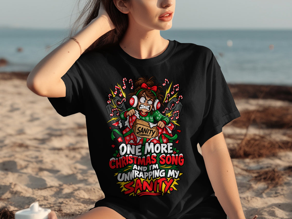 Black t-shirt graphic: "One more Christmas song and I'm unwrapping my sanity."
