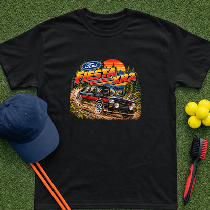 Black t-shirt with graphic of a Ford Fiesta XR2 driving off-road at sunset.
