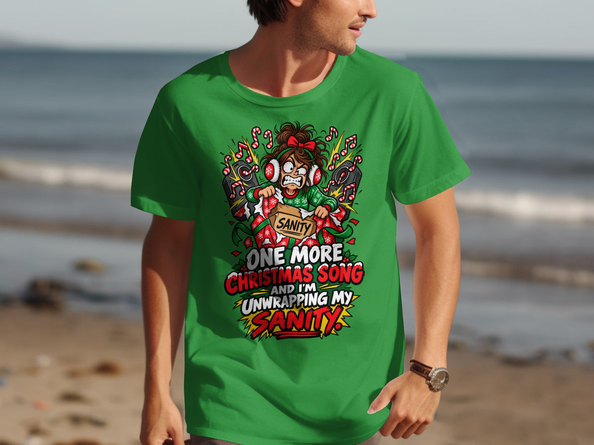 Green t-shirt with cartoon of woman unwrapping sanity from box, "One more Christmas song and I'm unwrapping my sanity."