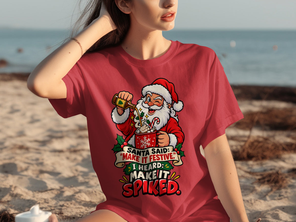 Santa graphic on red shirt saying "Santa said: Make it festive. I heard: Make it spiked."