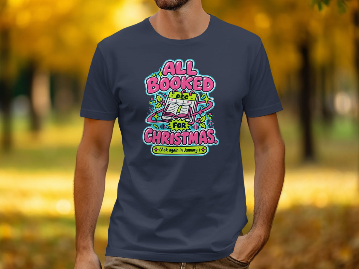 T-shirt graphic with text "All Booked For Christmas (Ask again in January.)".