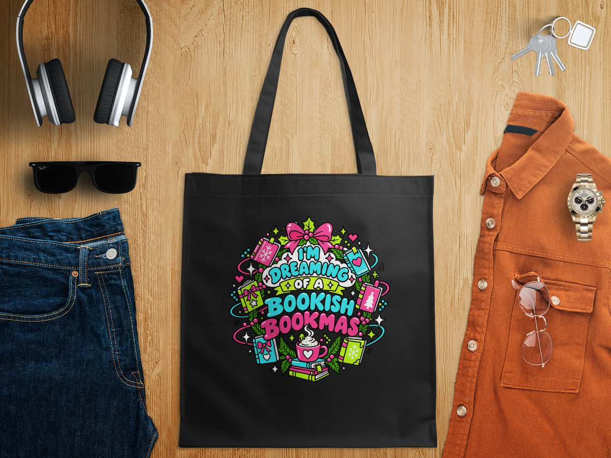 Black tote bag with "I'm dreaming of a bookish bookmas" graphic.