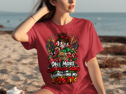 Red t-shirt graphic with text "One More Christmas Song and I'm Unwrapping My Sanity."