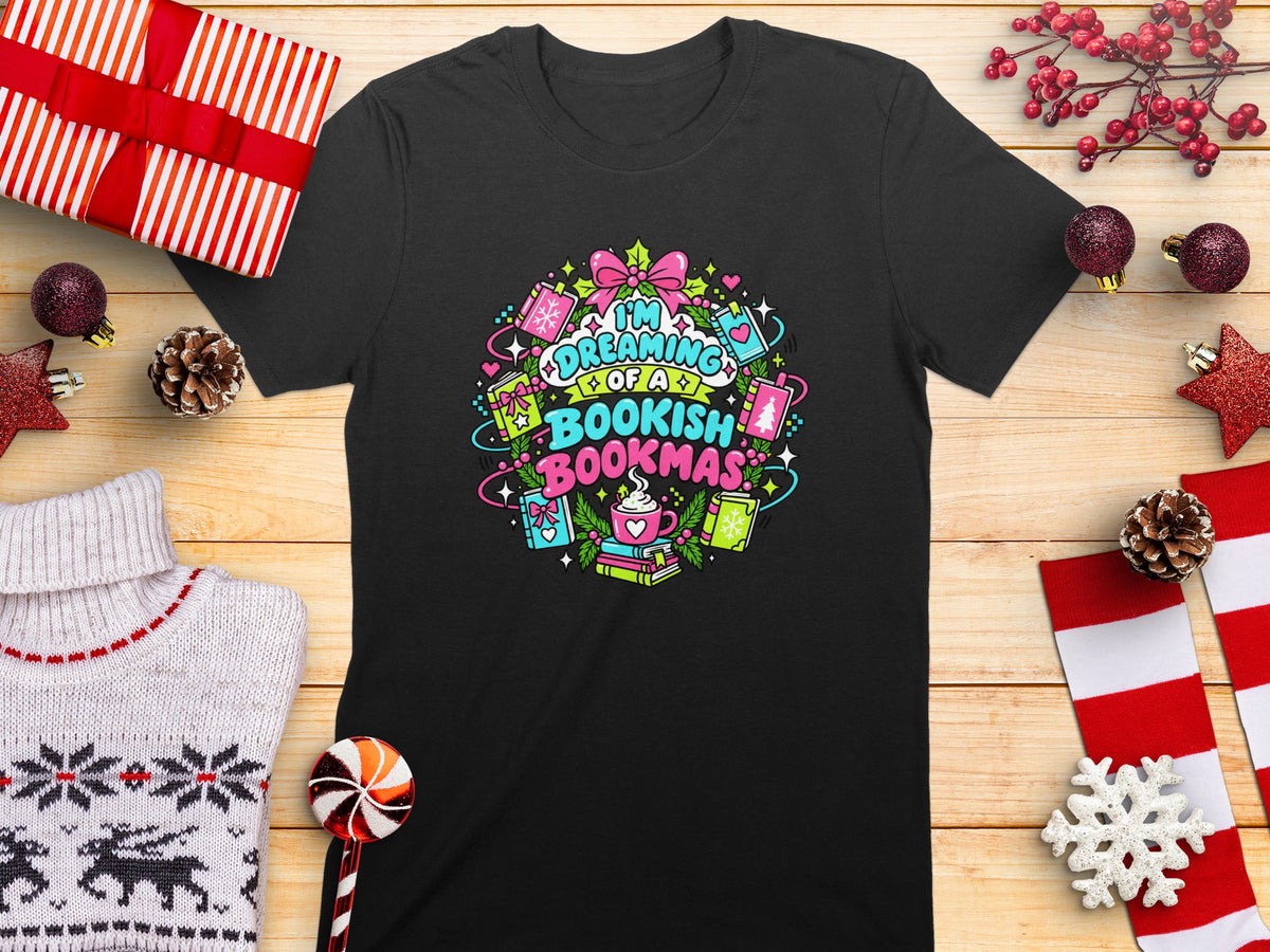 Black t-shirt with colorful "I'm Dreaming of a Bookish Bookmas" text and illustrations.