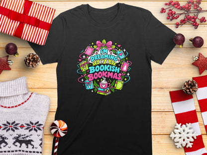 Black t-shirt with colorful "I'm Dreaming of a Bookish Bookmas" text and illustrations.