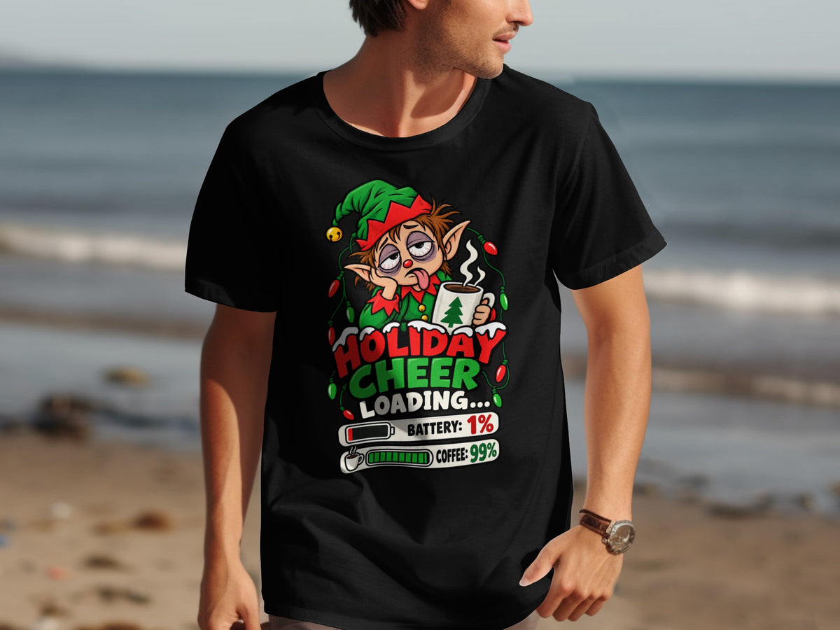 Black t-shirt with graphic of tired elf, "Holiday Cheer Loading", and battery/coffee charge status.