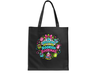 Black tote bag with "I'm Dreaming of a Bookish Bookmas" text and festive book illustrations.
