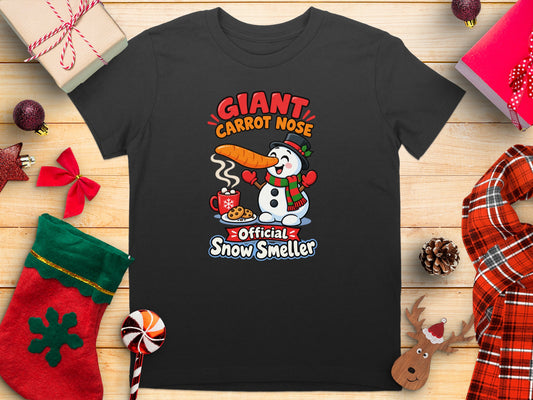 Dark t-shirt with a snowman graphic that says "Giant Carrot Nose Official Snow Smeller."