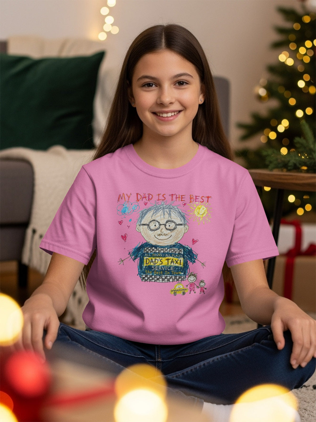 Pink t-shirt with child's drawing of dad driving "Dad's Taxi Service."