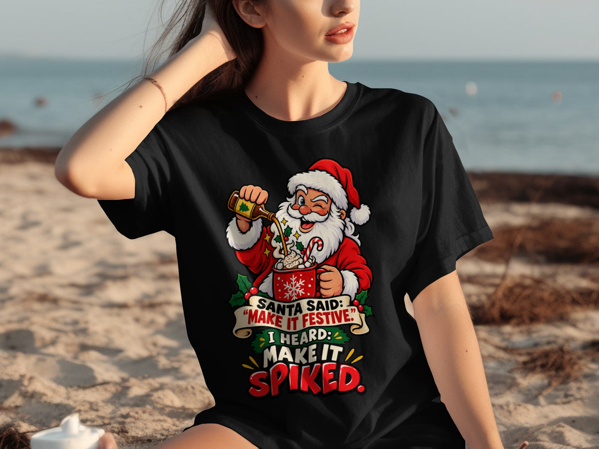 Black t-shirt with Santa pouring a drink into a festive mug with text.